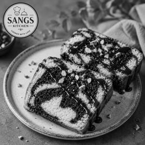 Marble Cake With Chocolates Sauce  And Nuts