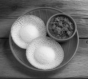 Appam With Beef Curr