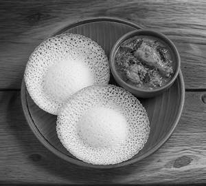 Appam With Nadan Kozhi Curry
