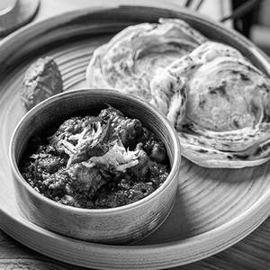 Chicken Pepper Fry, Malabar Parotta, Tomato Chutney