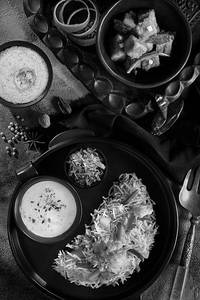Veg Hot And Sour Soup + Veg Biryani + Veg Raita + 2 Roasted Papad