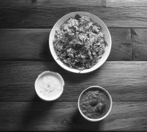 Mutton biryani with raita with salad