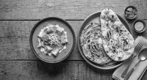 Paneer Butter Masala + 1 Butter Naan + 1 Lacha Paratha