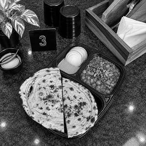 1 Butter Kulcha + Punjabi Chole + Onion Salad [Serves 1]