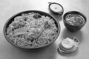 Witw Dum Murgh Biryani With Raita/gravy [serves 2-3] [650 Ml]