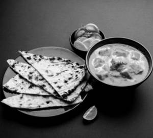 Paneer Butter Masala + 2 Rotis+ Coke(250ml)