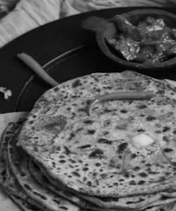 2 Aloo Mirchi Pyaaz Parantha + Raita