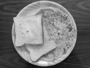 Masala Butter Omelette (2 Egg) with 2 Pcs of white  Bread Butter Slice