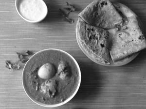 Egg curry roti combo