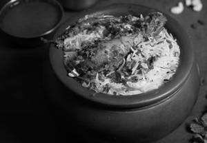 Handi Chicken Leg Biryani With Raita & Gravy