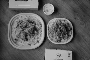 Chicken Biriyani (regular)+free Veg Biriyani (mini)