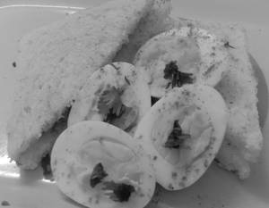 Boiled Egg (2 Pcs) with Masala and Slice of Bread Butter (2 Pcs)