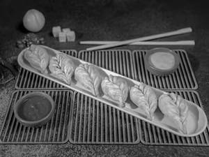 Paneer Fried Momos With Cheese Dip.