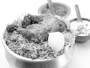 Chicken Biryani (Handi) (Served with Raita & Salad)