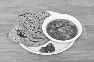 2 Plain Paratha + Seasonal Veg