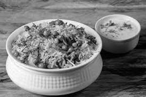Veg Biryani With Free Cold Drink & Raita
