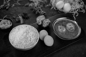 Egg Curry & Tikka Rice Bowl