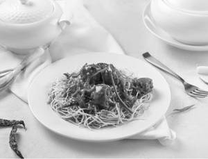 Pan Fried Noodles with Vegetable balls in hot garlic sauce