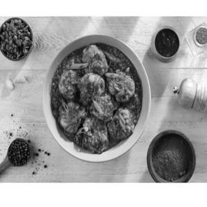 Paneer And Corn Wheat Momos In Gravy