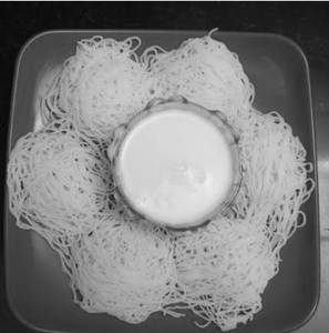 Idiyappam with Coconut Milk Added Naatu Sakkarai