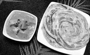 Kadhai Paneer Half + Butter Naan 1 + Plain Roti