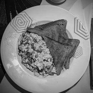 Scrambled Egg With Sausage On Toast
