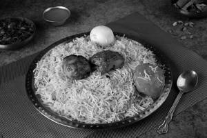 Fish Tikka Biryani With Egg And Raita [ 2pc Tikka ]