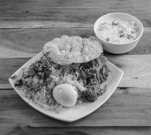 Chicken Egg Biryani With Raita & Gravy
