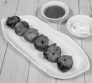 Veg Tandoori Momos  (7 Pieces)