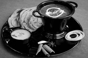 Dal Makhni [Full] + 2 Laccha Paratha + 2 Butter Naan + Coke 200 Ml