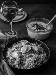 Chicken Dum Hyderabadi Biryani With Free Cold Drink & Raita