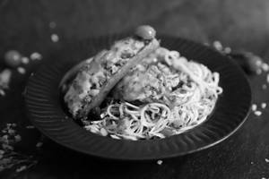 Zucchini Noodles In Alfredo Sauce With Chicken