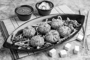 Fried Veg Schezwan Momos (6 Pcs)