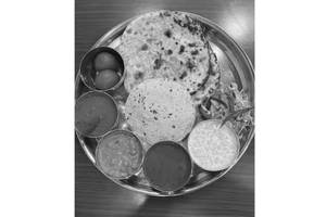 Paneer Tikka Masala Naan Thali