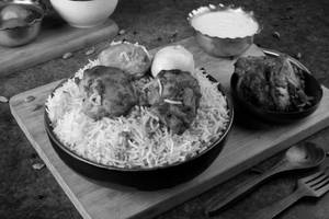 Boneless Tikka Biryani With Egg Raita And Fry Chicken