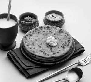 2aloo Paratha + 1 Sweet Lassi