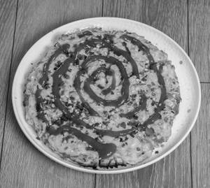 Onion with capsicum menia pizza                                            