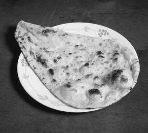 Garlic Naan ( 1 Pc )
