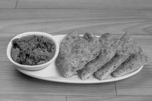 Plain Paratha [1Pc] with Chicken Curry [2Pc]