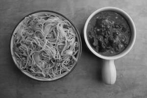 Veg Hakka Noodles With Veg Ball Schezwan Gravy