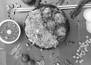 Schezwan Fried Rice & Veg Manchurian Bowl
