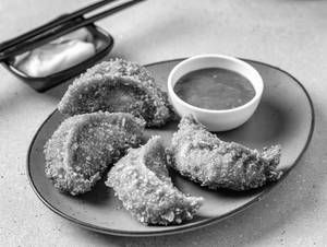 Chicken kurkurey momos