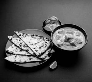 Butter Paneer Masala + 2 Butter Naan