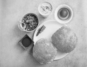 Chole Bhature + 1 Malai Lassi + 1 Pc Gulab Jamun