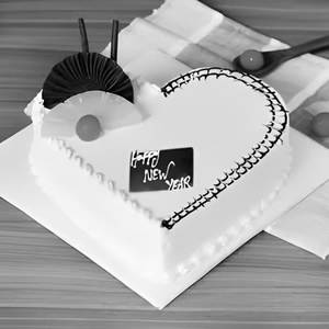 Eggless Heart Shaped Pineapple Cake