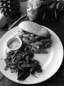 Spicy Pulled Chicken, Fresh Lettuce, French Fries Filled In A Soft Baguette
