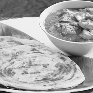 Malabar Parotta With Chicken Masala