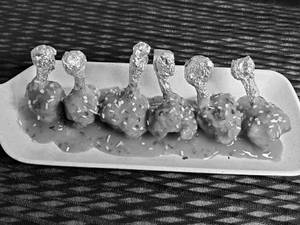 Schezwan Chicken Lollipop (6 Pieces)