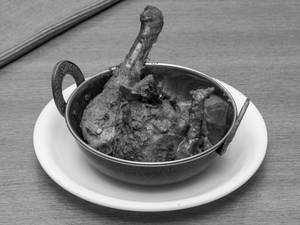 Pichipotta Nattu Kozhi with Bone
