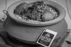 Kolkata Chicken Biryani Cooked In Handi.